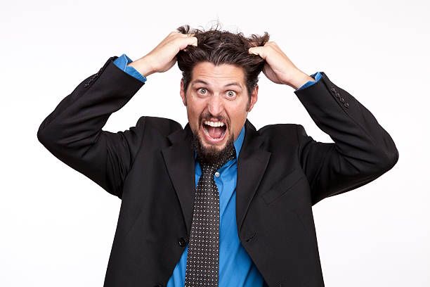 Man pulling hair out